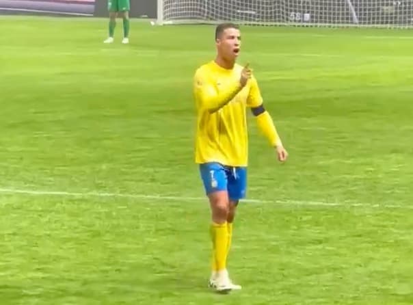 Al Nassr captain Cristiano Ronaldo pictured waving his finger while shouting at Al-Hilal fans after they chanted "Messi, Messi, Messi" during a game in the 2024 Riyadh Season Cup